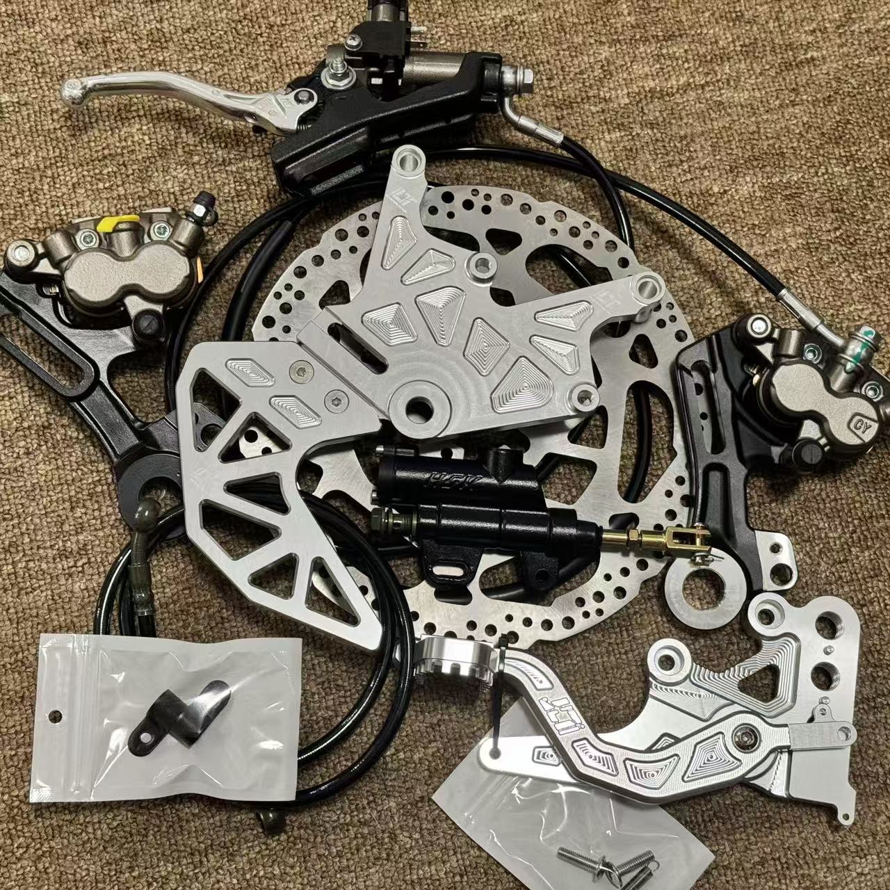 طقم حامل مزدوج للمكابح الخلفية - مراجعة Brake Caliper وسعره