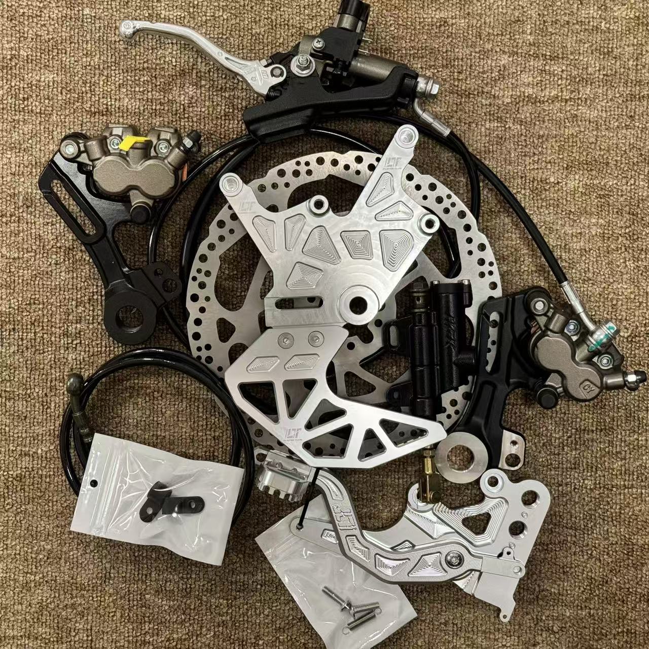 طقم حامل مزدوج للمكابح الخلفية - مراجعة Brake Caliper وسعره